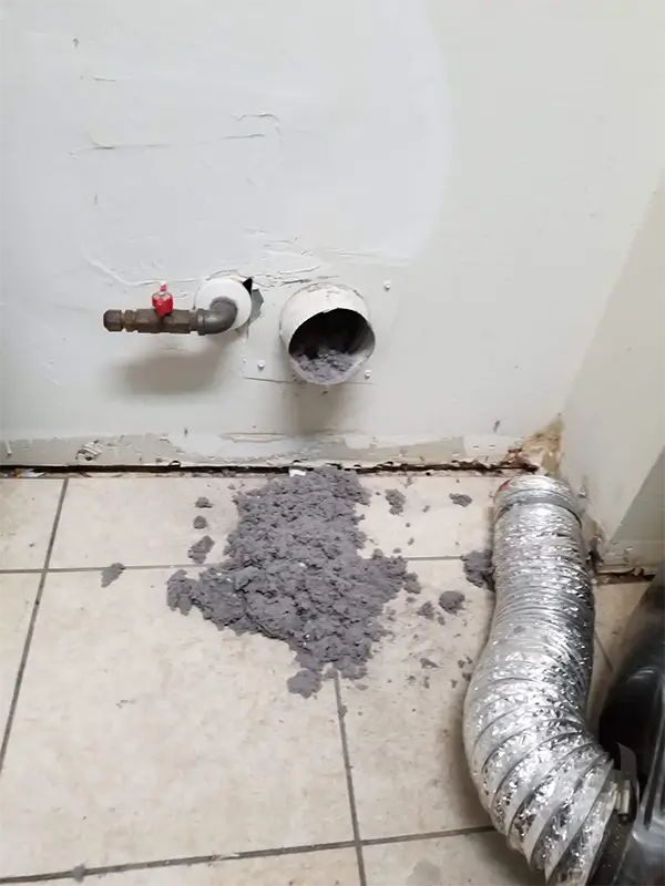 Dryer Vent Cleaning by Proattic. Mass of lint removed from dryer vent pipe in the waslll and the flex pipe.